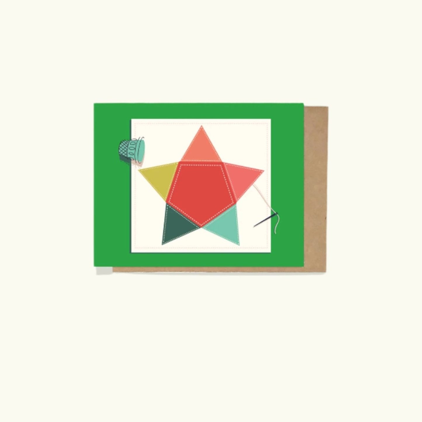 A greeting card with a hand-quilted star design, needle, and thimble, presented on a beige background with a green border.

