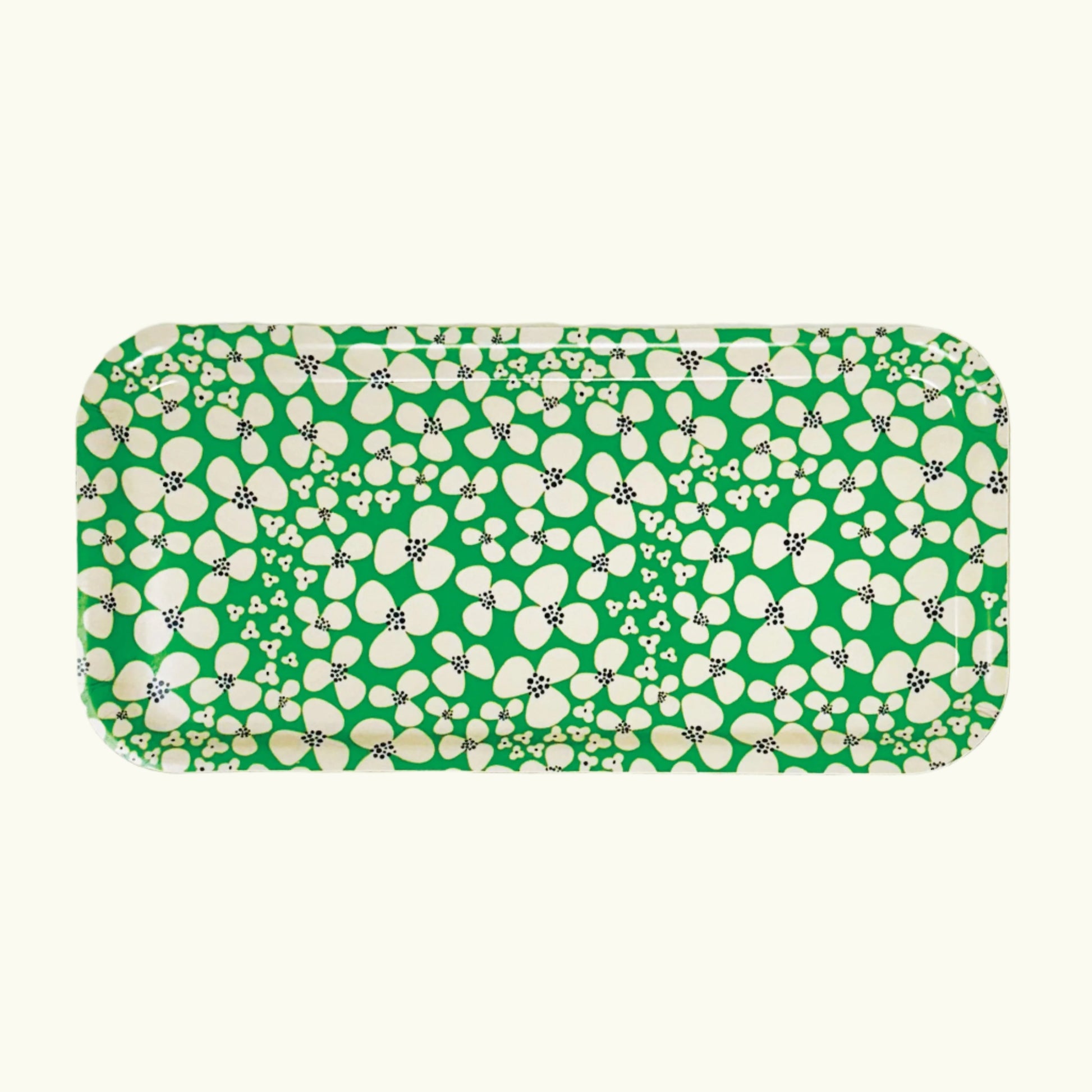 A rectangular birch wood tray with a green and white happy floral pattern.
