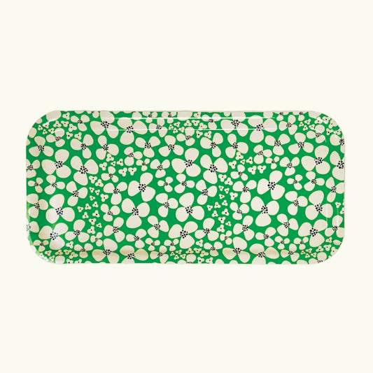 A rectangular birch wood tray with a green and white happy floral pattern.