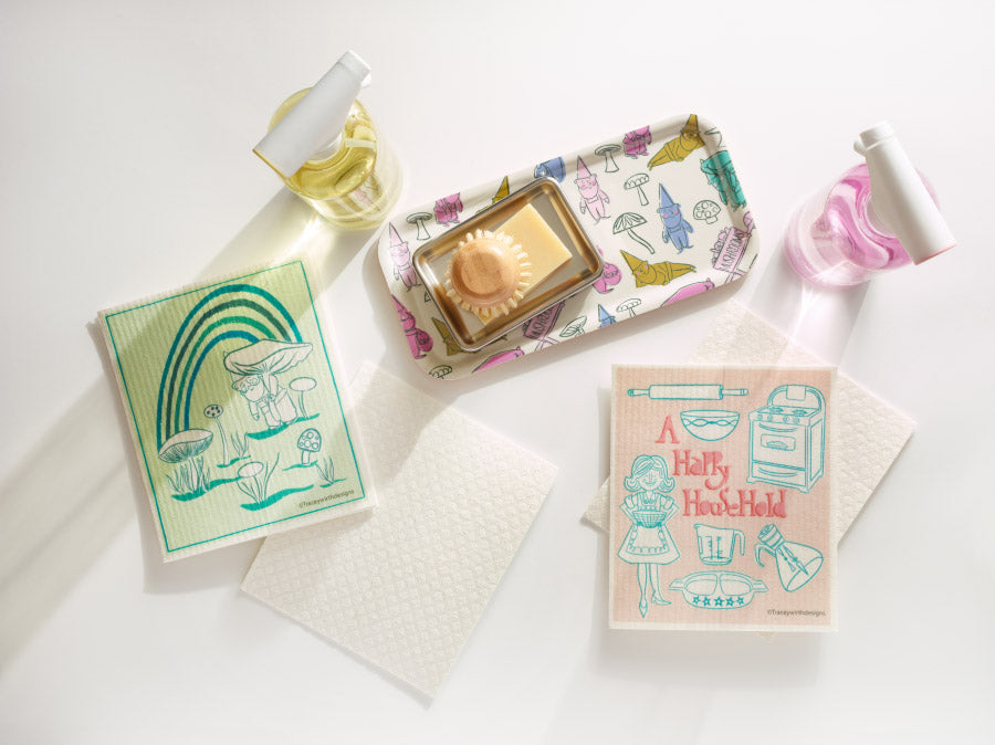 A rectangular birch wood tray with a whimsical pattern of gnomes,and mushrooms in various colors.4