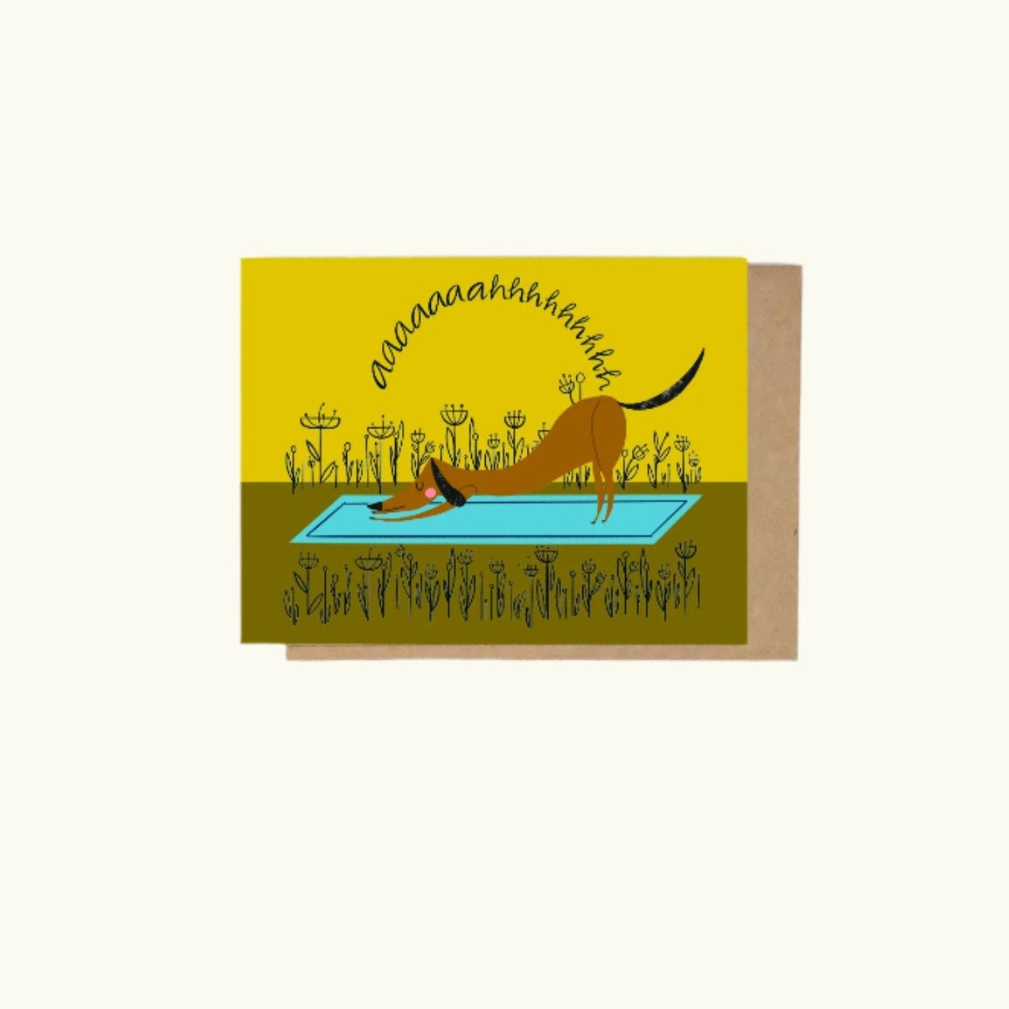 Greeting card featuring an illustration of a dachshund lying down on a blue yoga matt with a yellow background and floral elements in the field and the word 'ahhhhhhhhhhhh' on the front written in a cursive type font


